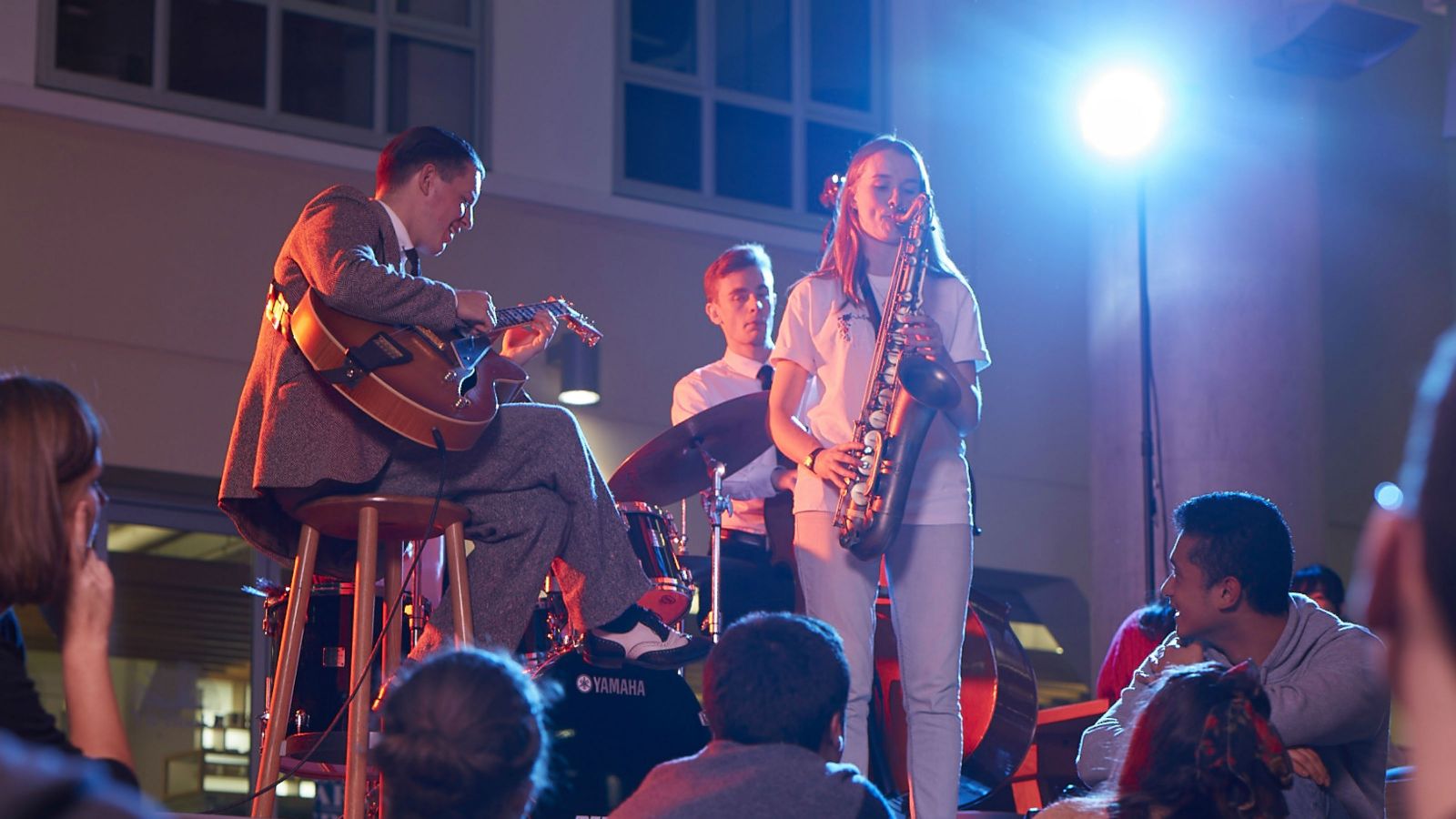Jazz musicians playing for an audience.