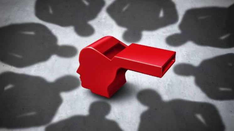 Whistleblowing at work - an image of a red whistle with the shadow of humans surrounding it.