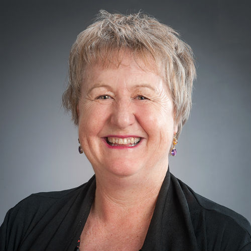 A head and shoulders portrait image of Kathy Holloway.
