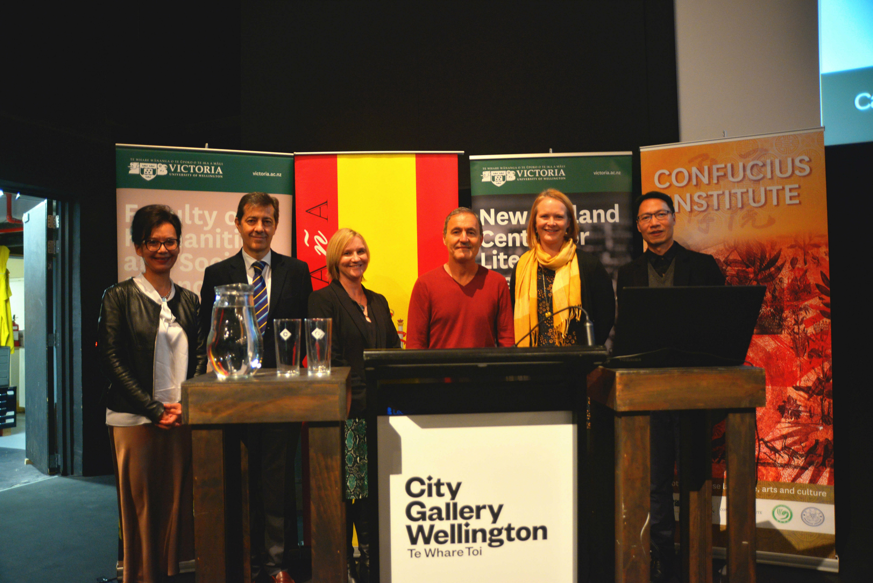 Film Subtitling Event – six people pose by lecterns.