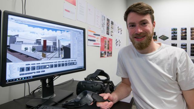 Daniel with computer and vr headset