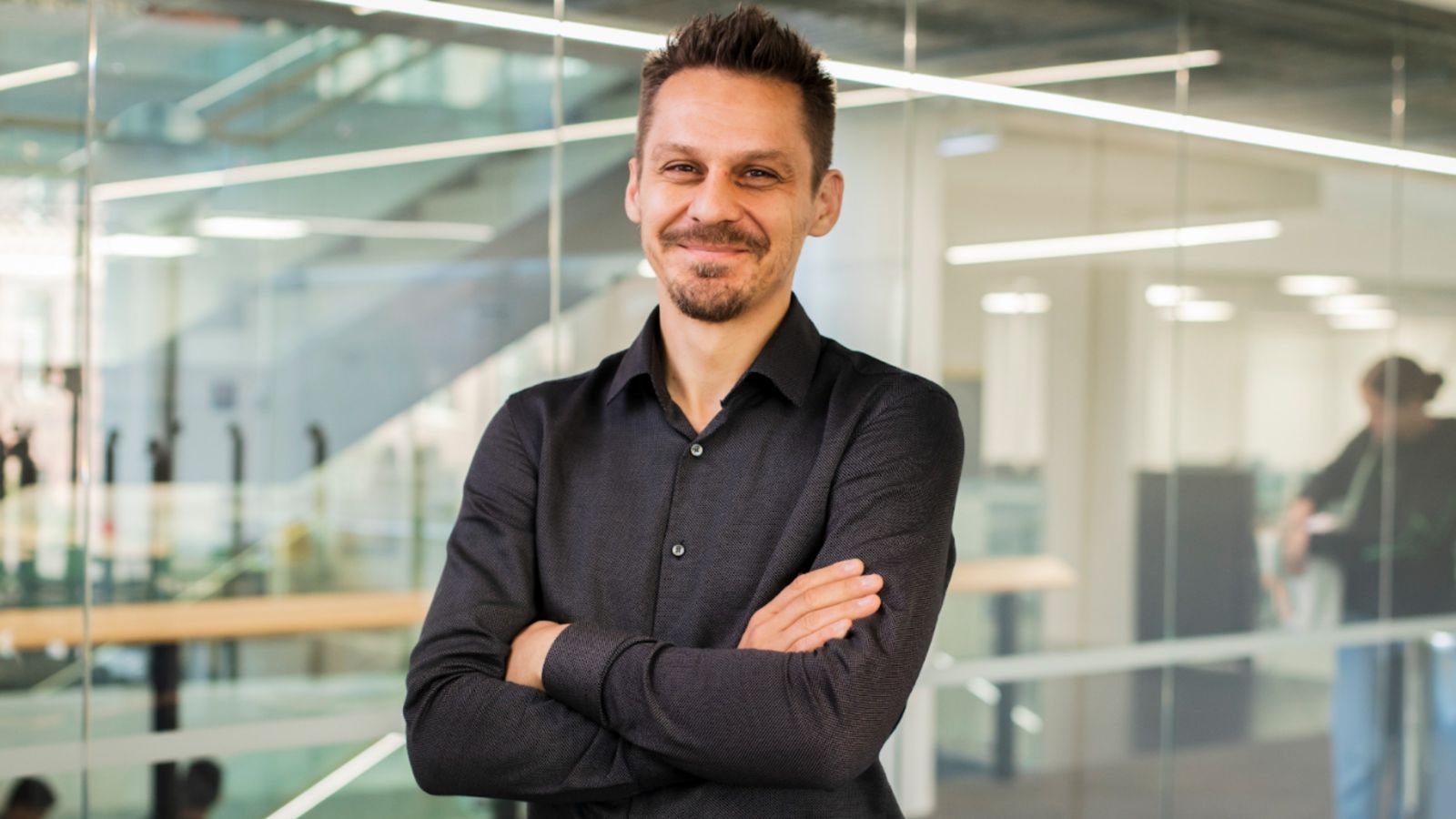 Associate Professor Markus Luczak-Roesch standing in Rutherford House.