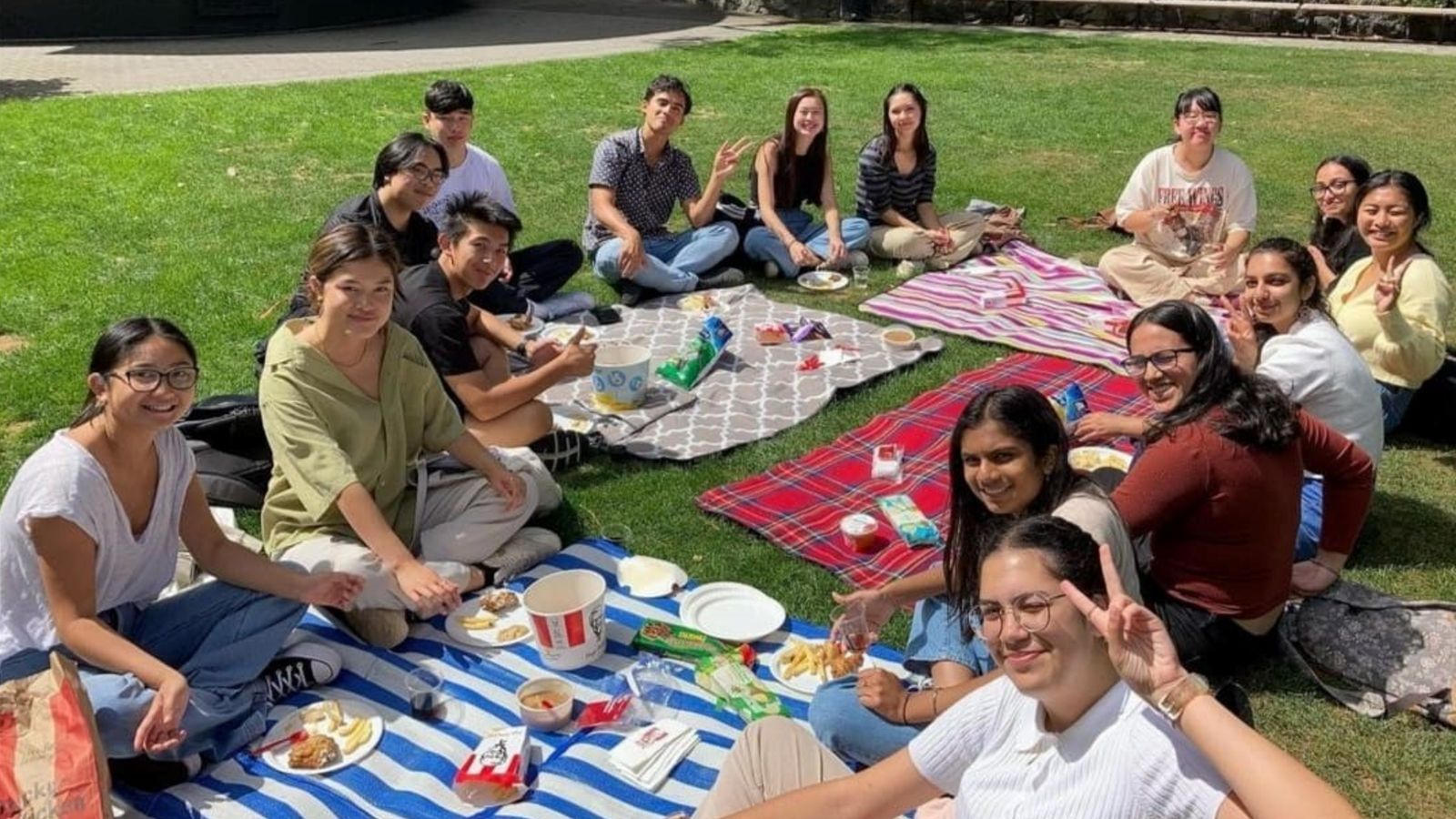 Asian Law Students Association members sitting together during a picnic.