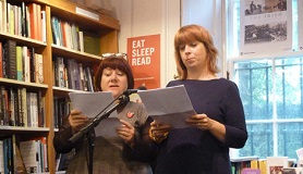 Image of authors Zoe Strachan and Louise Welsh reading at the 2013 Edinburgh Book Festival. 