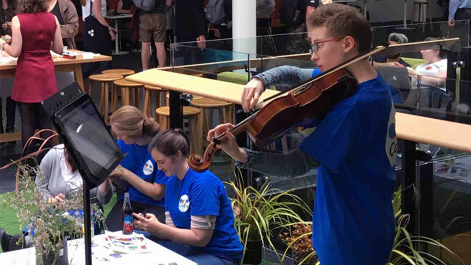 Georgia Steel plays the viola for students at Victoria.