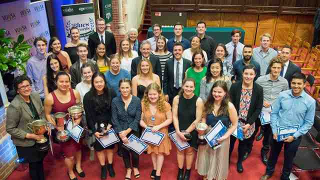 Recipents of the Blues awards stand together smiling up at the camera.