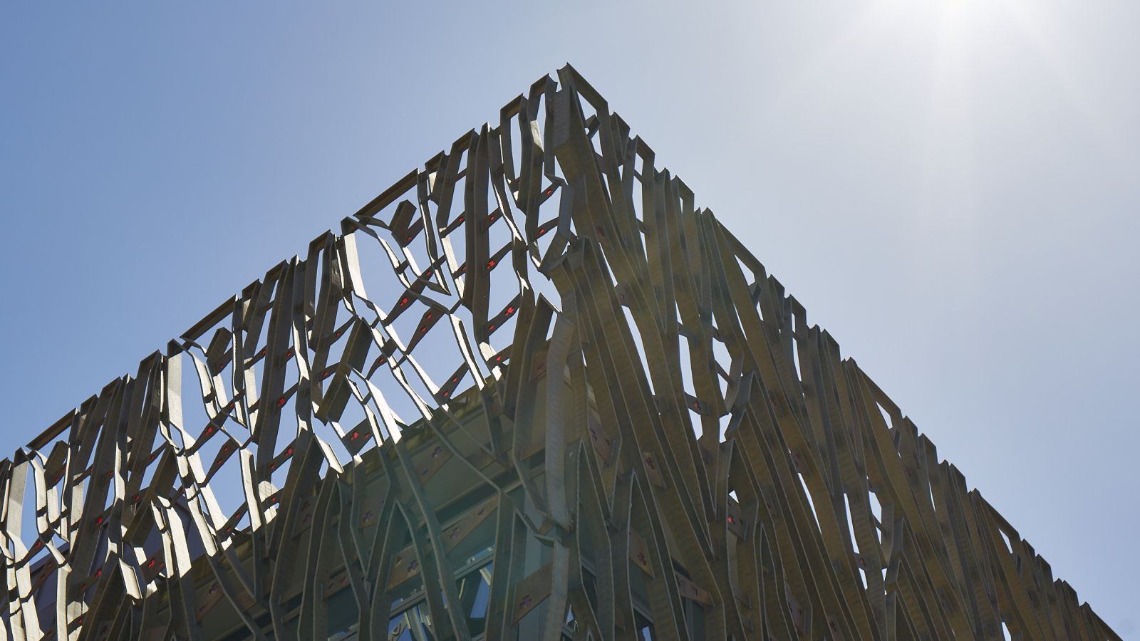 Artistic iron work that trims the upper part of a building.