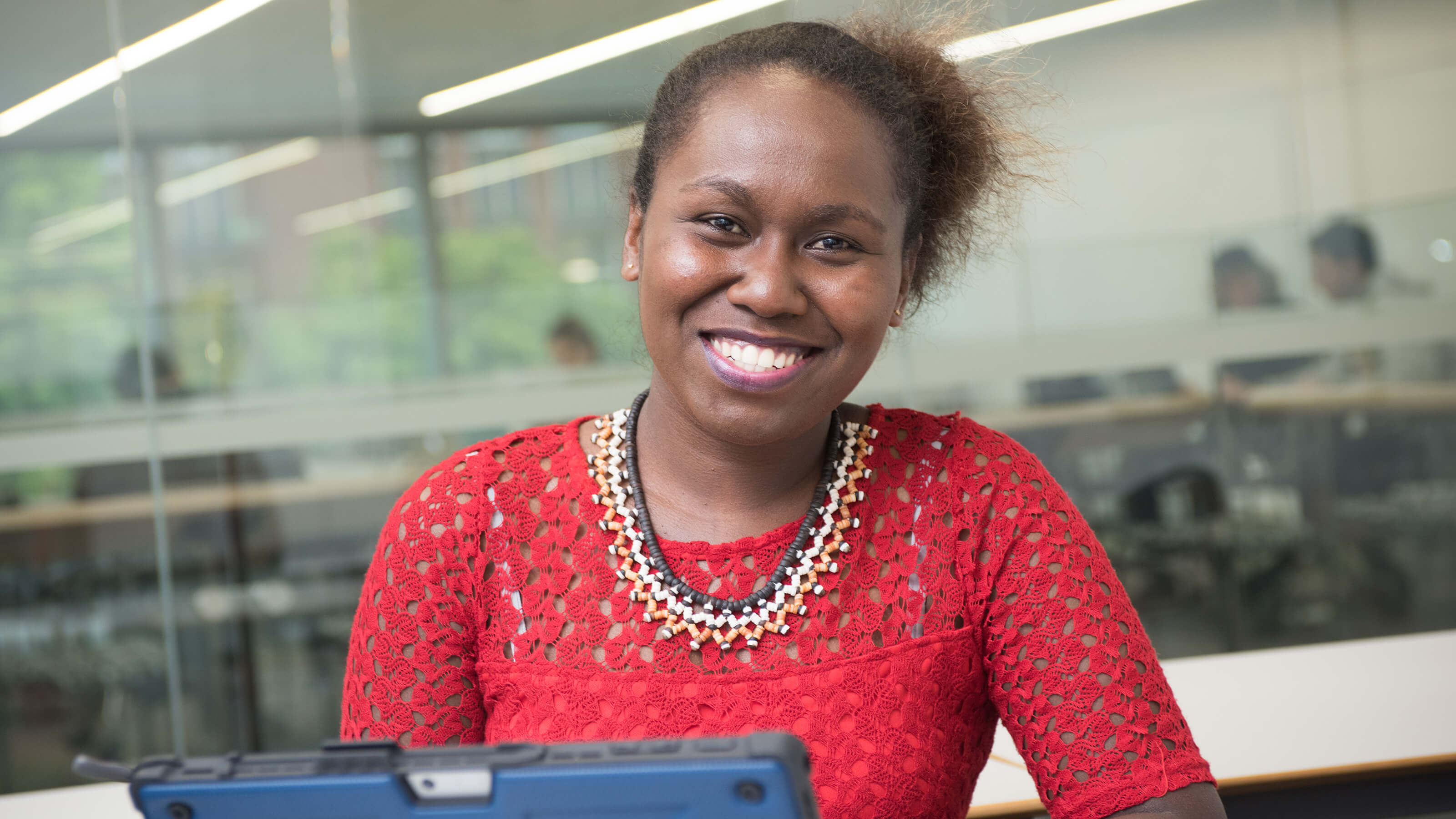 Postgraduate student working at computer