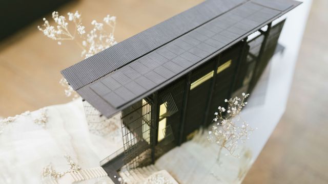 An image showing a model house, the project that won the architecture award.