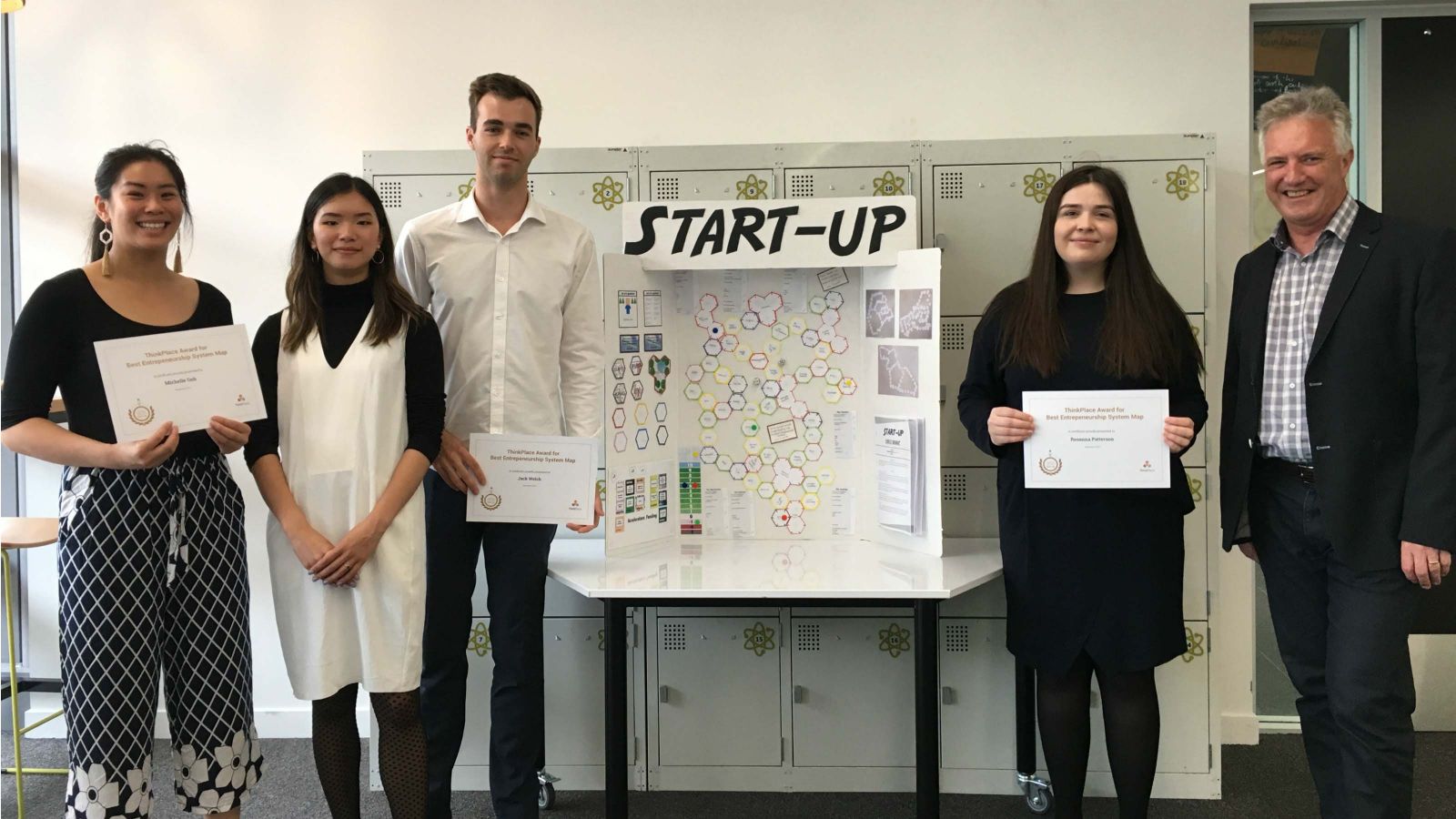 Creators of the Start-Up after being presented their certificates by ThinkPlace founder Jim Scully and Designer Cassandra Ong.