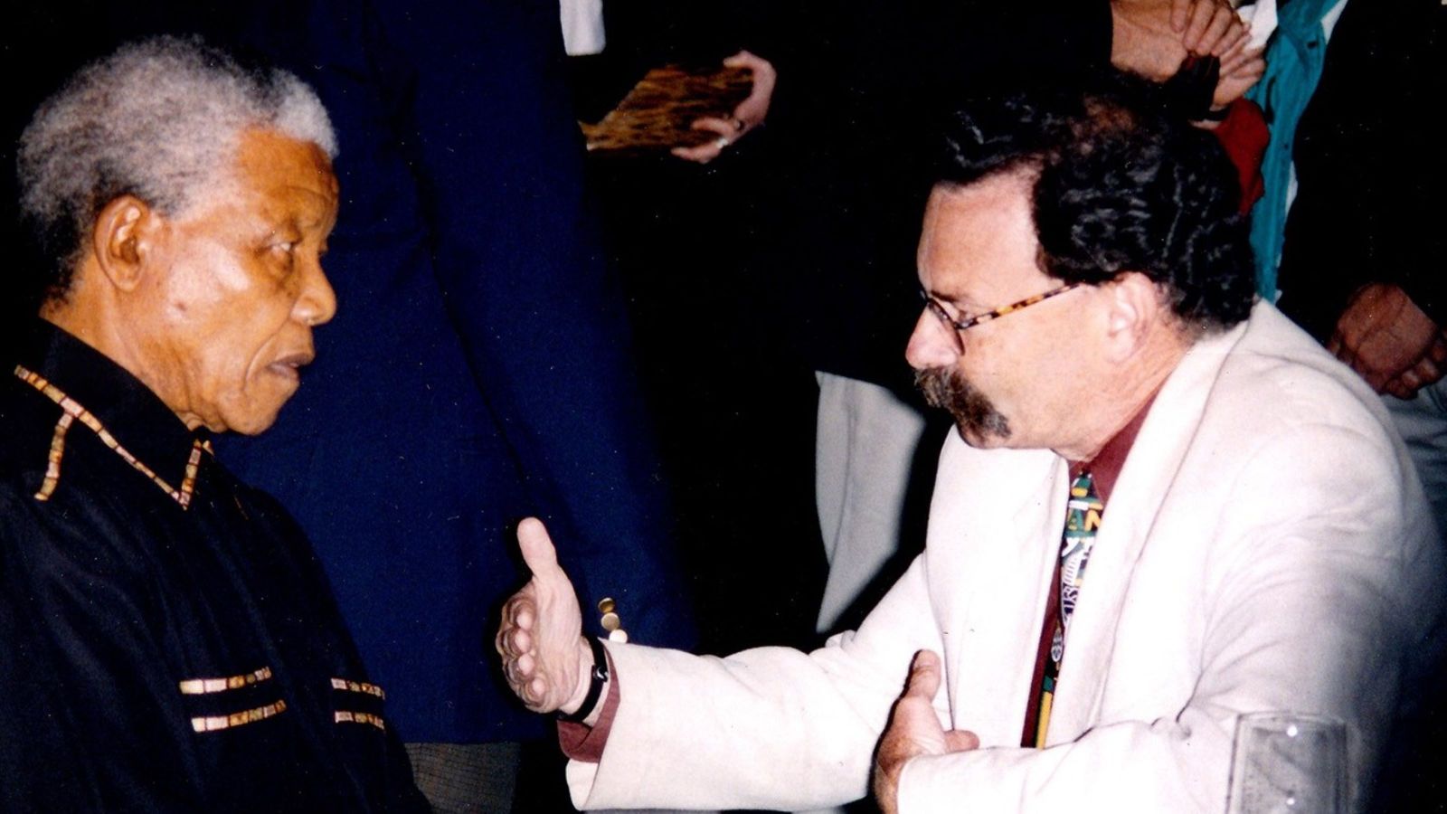 South African anti-apartheid leader and president Nelson Mandela in conversation with Trevor Richards 