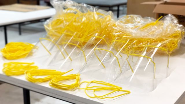 yellow plastic framed face shields for essential workers
