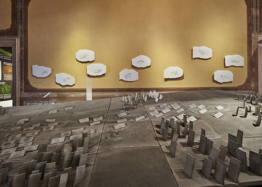Simon Twose exhibit Concrete/ cloud/. A huge slab of concrete with smaller pieces of concrete sitting on top