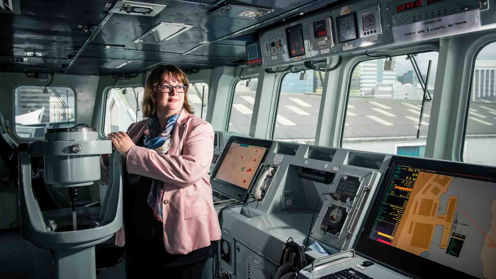Senior Lecturer Joanna Mossop inside the control deck of a navy ship.
