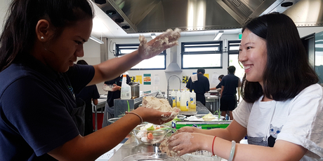 Miss Ou makes Chinese lanterns with a group of Year 8 students. Photo/Supplied