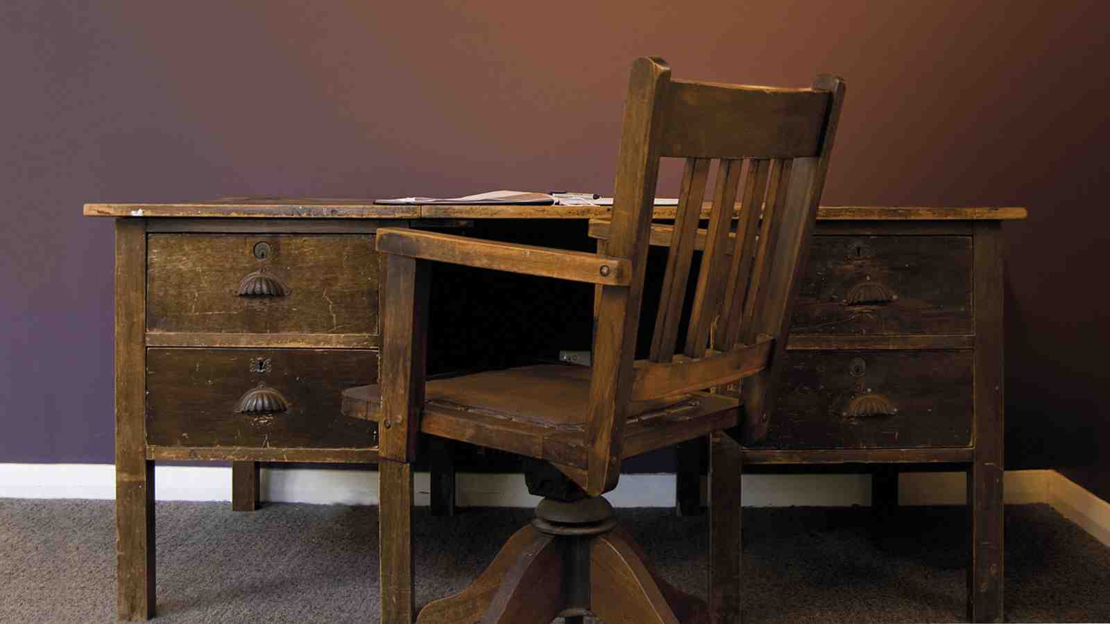 The dark wooden desk that belonged to Janet Frame.