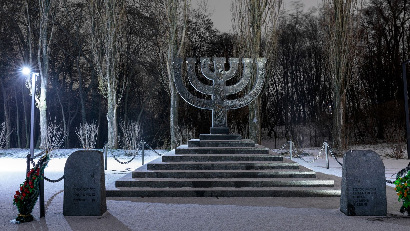A nighttime view of a memorial on the site of the 1941 Babi Yar massacre