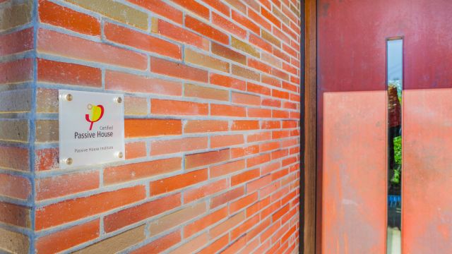 Passive House Institute New Zealand logo on building.