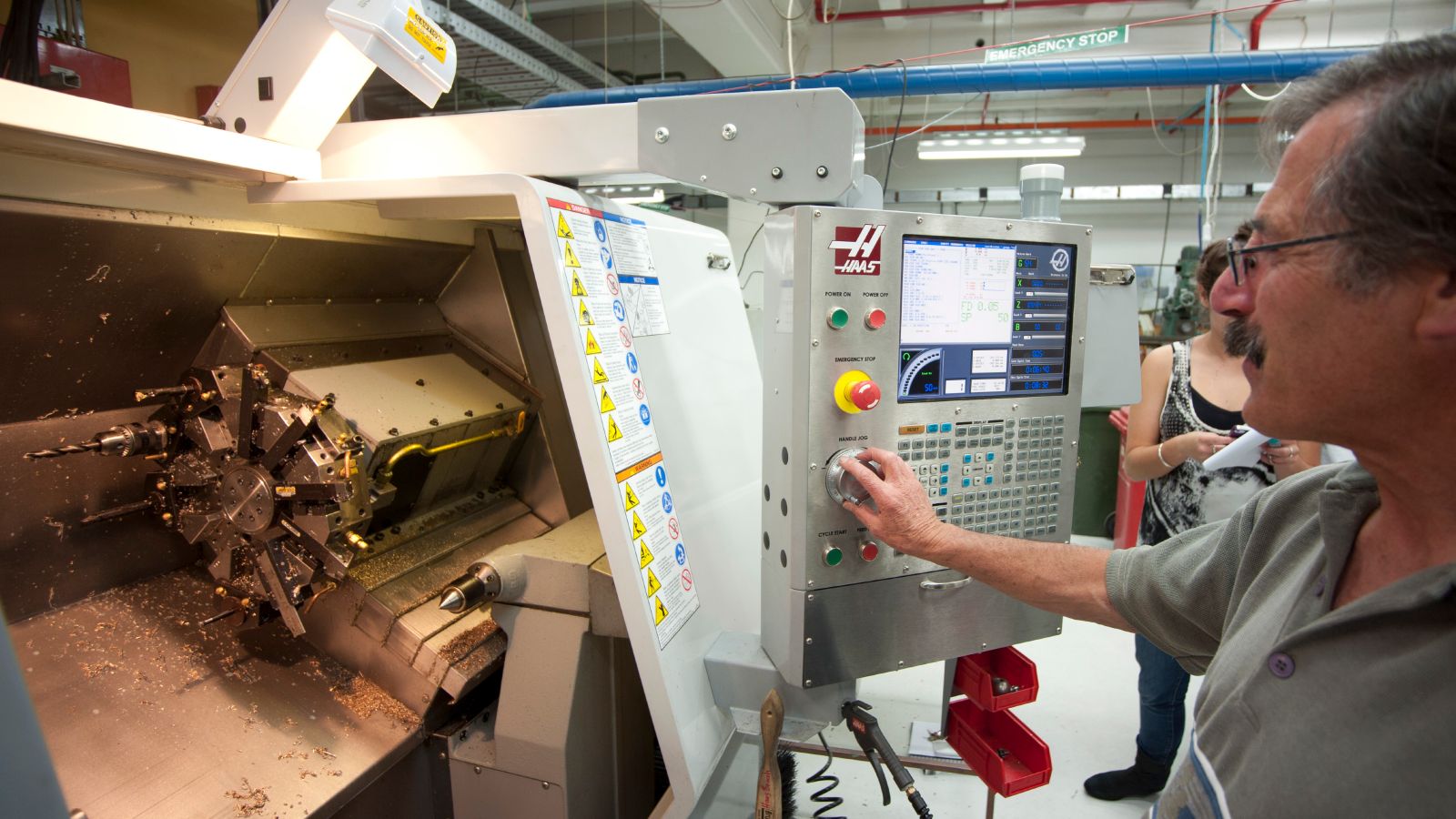 HAAS CNC lathe being used by technician