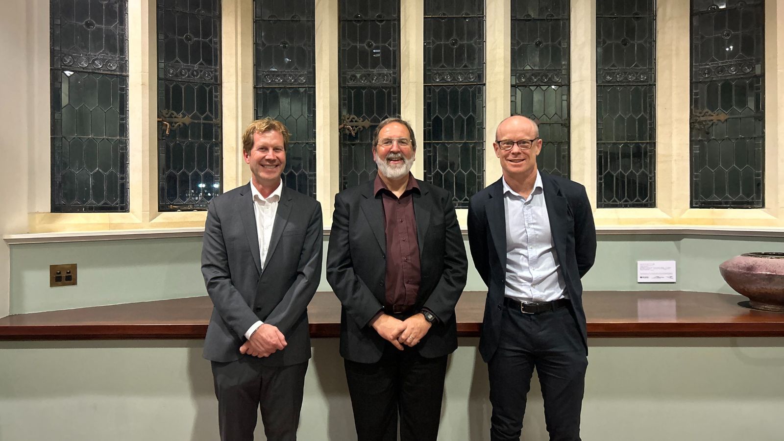 Professor Paul Teesdale-Spittle, flanked by two other staff members, at his inaugural lecture