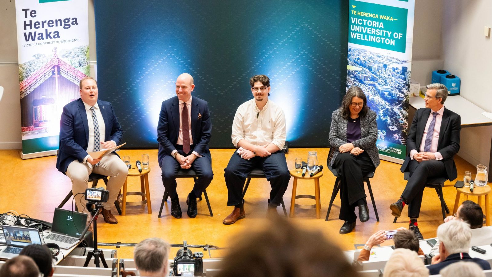 Alumnus Brad Olsen facilitates a panel discussion with leading economists and researchers exploring the New Zealand economy ahead of the 2026 General Election.