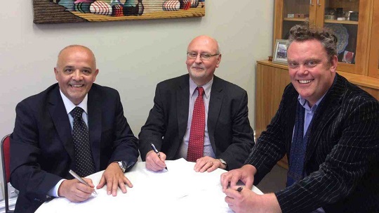UVM and VILLA representatives signing agreement agreement
