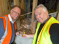 Victoria University's Dr Nigel Isaacs and Buildsure Associates Jim Bowler underneath a house, checking the quality.
