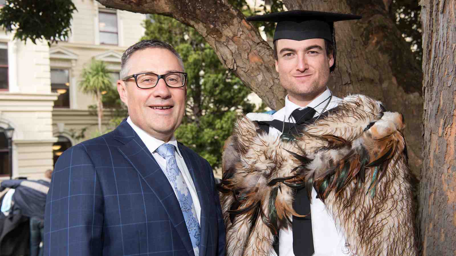 Jack Fletcher, right, with his father Hamish Quentin Fletcher. Standing in front of the Law School.