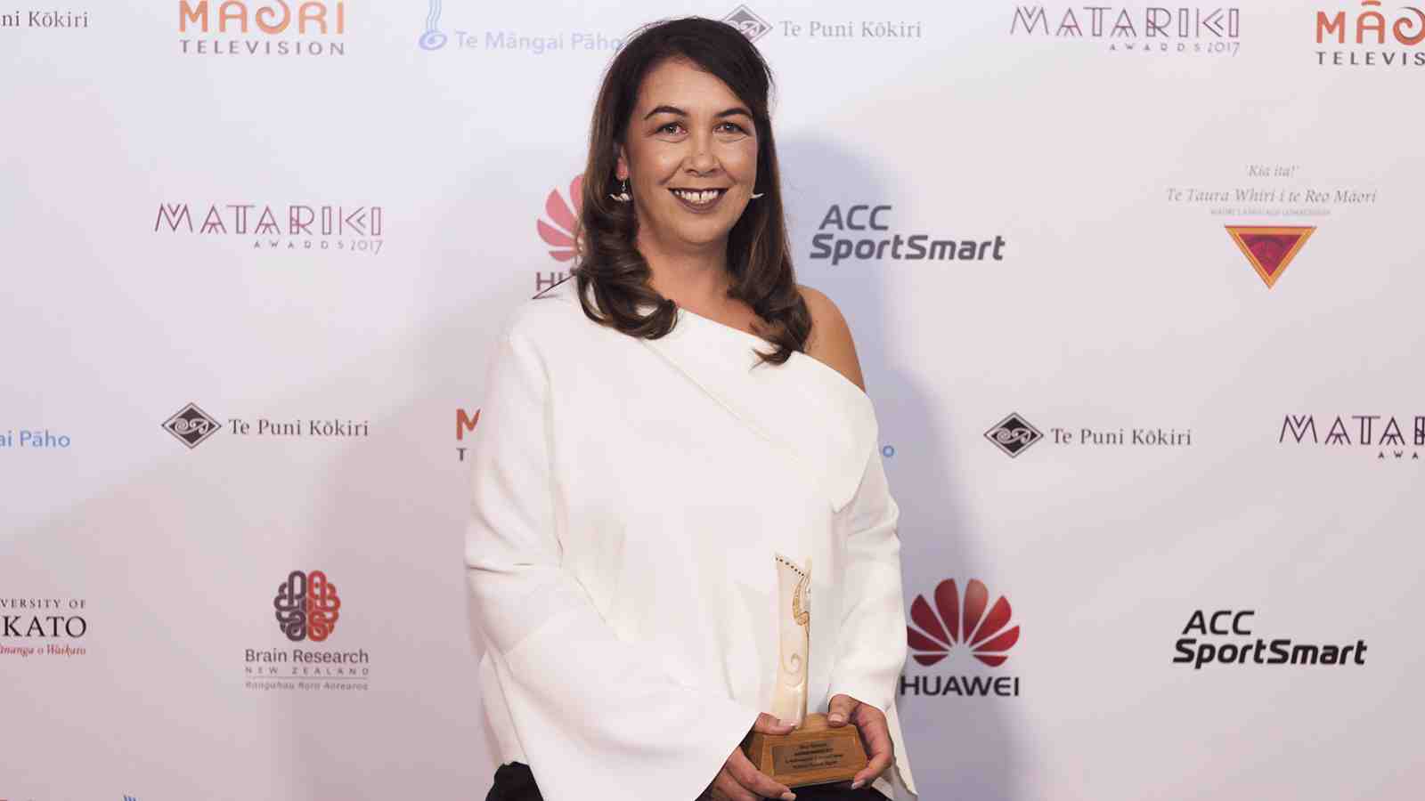 Rawinia Higgins holds her award at the Matariki Awards