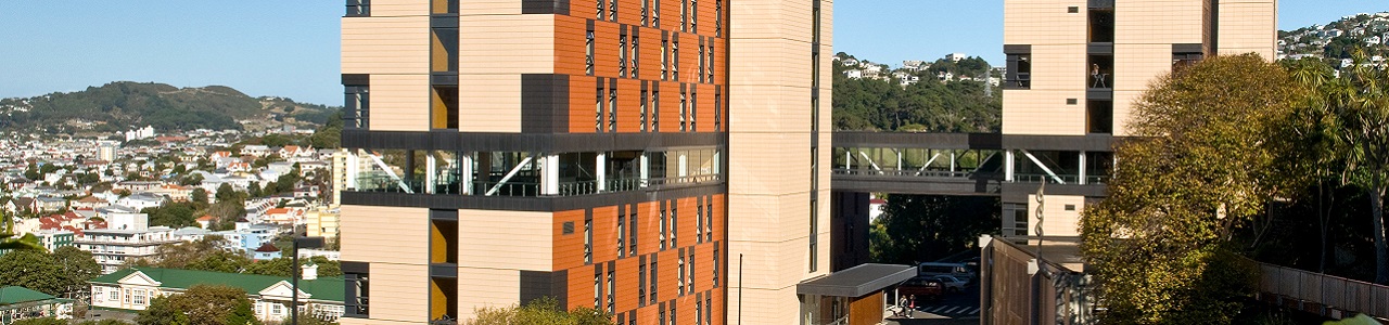 An external view of the Te Puni building with residential buildings in the background.