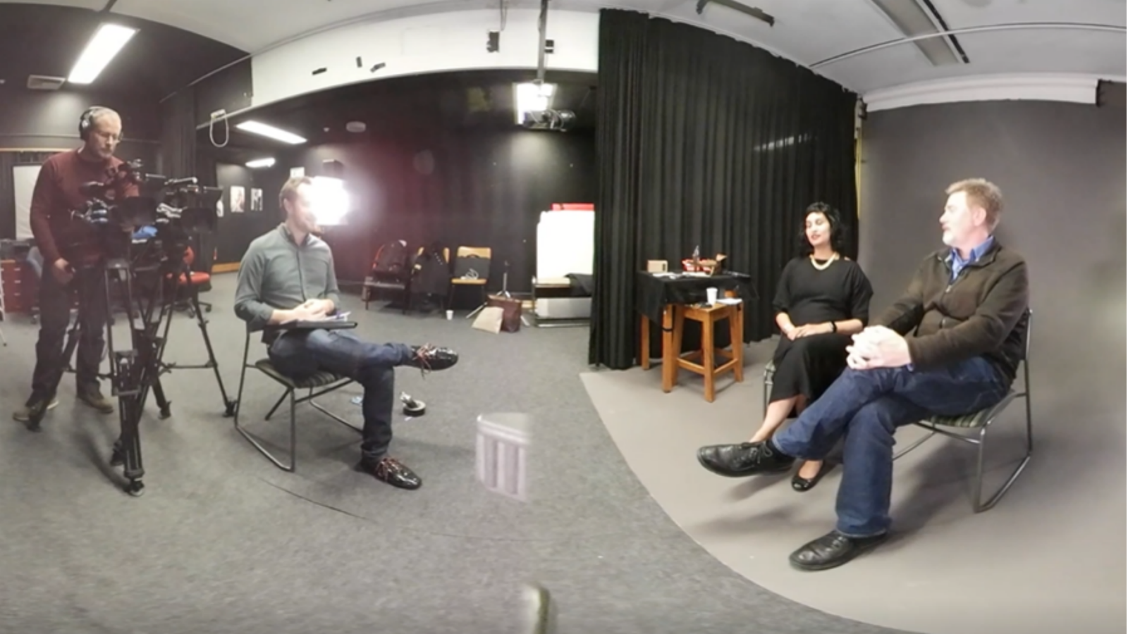 Screen capture from a 360-degree video of behind the scenes of Colliding Conversations interview