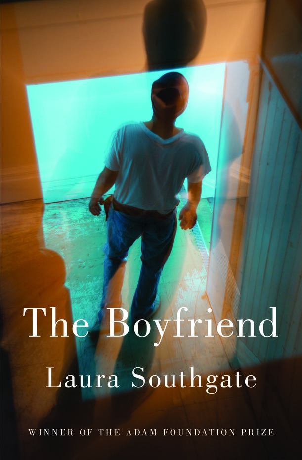 Cover of The Boyfriend paperback book. A mand stands in a white shirt and blue jeans.