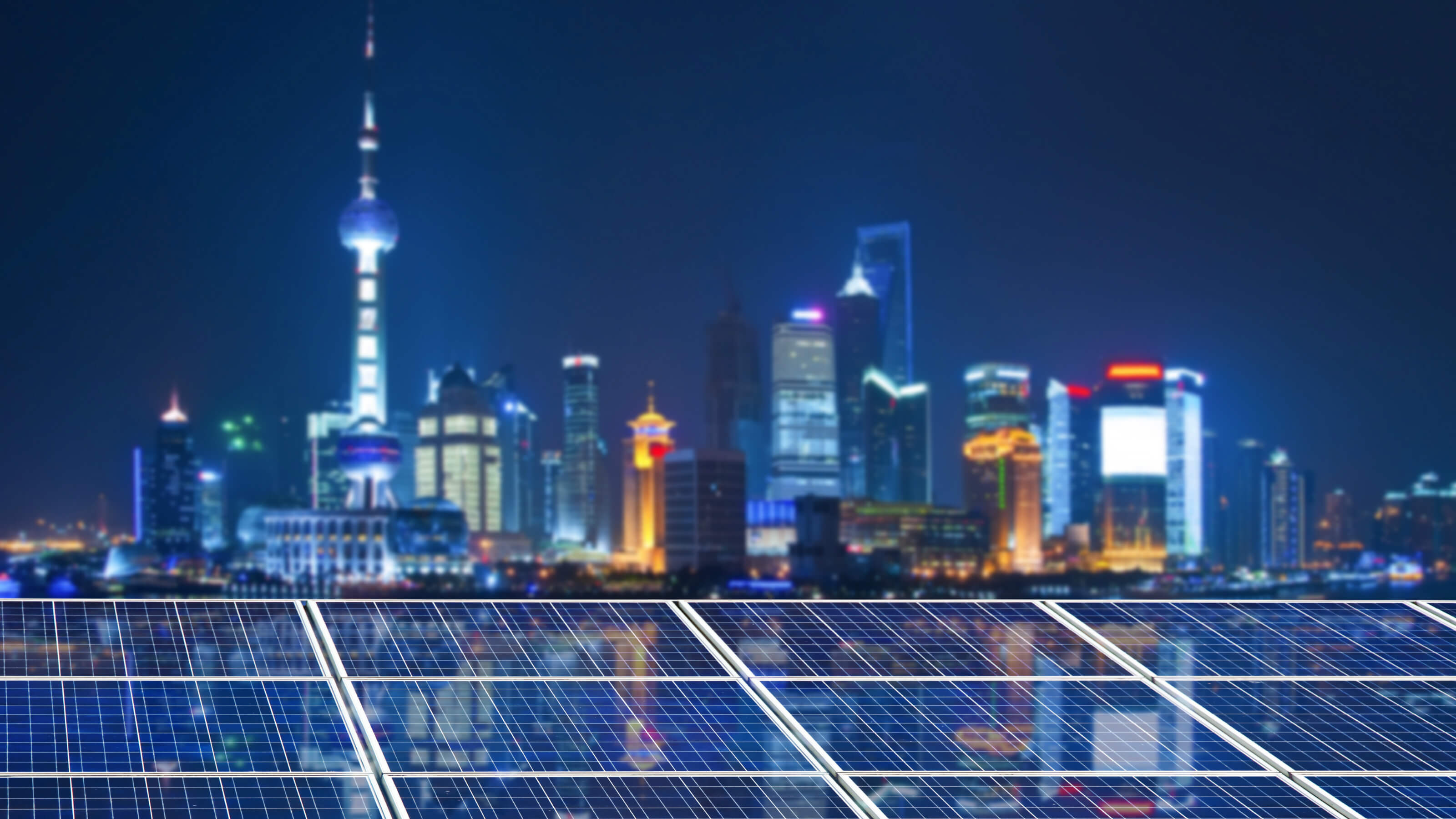 Image of Shanghai skyline with solar panels in front