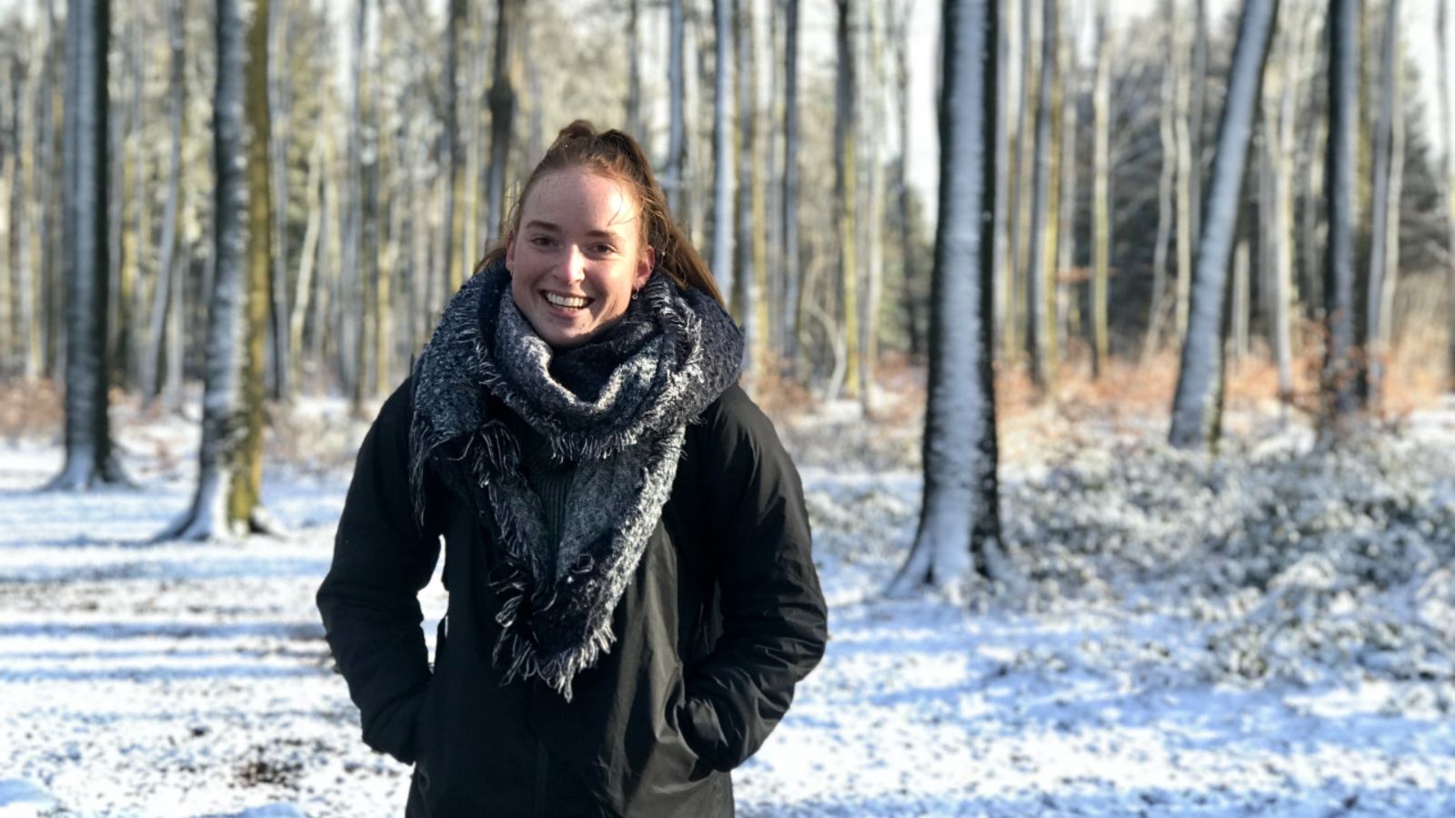 Amy Norris in a snowy forest