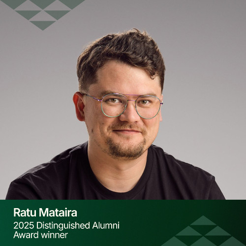 A close up photo of Dr Ratu Mataira, a young Māori man with brown hair wearing glasses and looking at the camera,