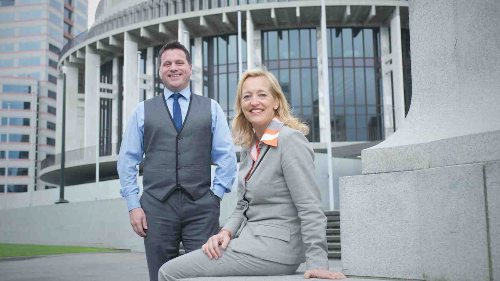 Professor Miriam Lips and Dr Michael Macaulay infront of the Beehive building in Wellington.