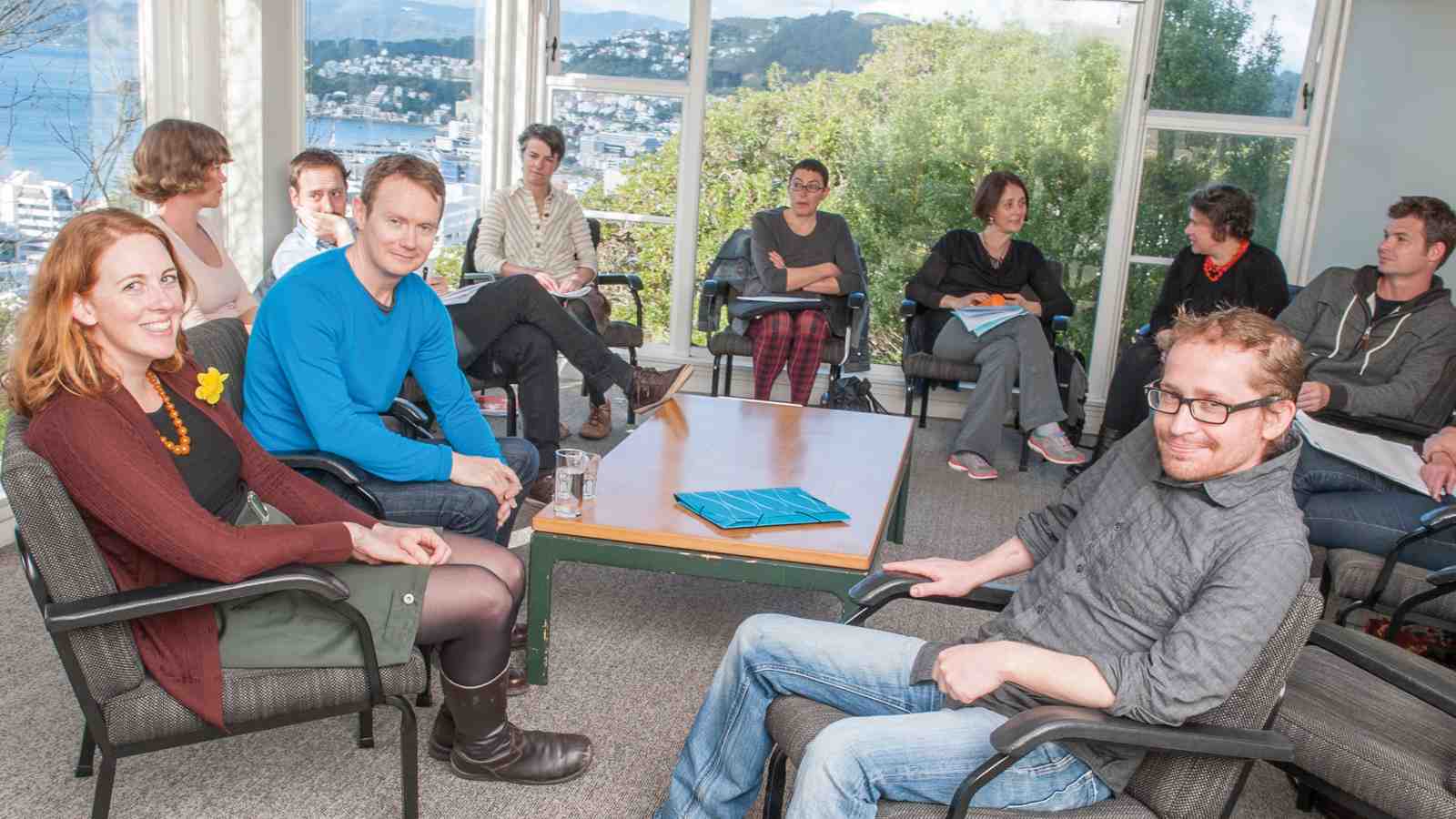 IIML Director Damien Wilkins (in blue) gets ready to discuss PHD research with Angela Andrews, Peter Cox and other creative writing students.