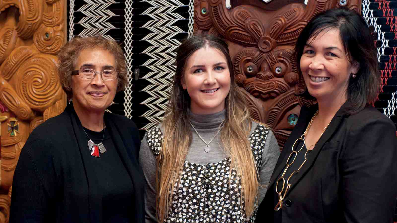 From left: Te Ripowai Higgins, Kuratapirirangi Higgins and Professor Rawinia Higgins at Te Herenga Waka marae, Kelburn campus