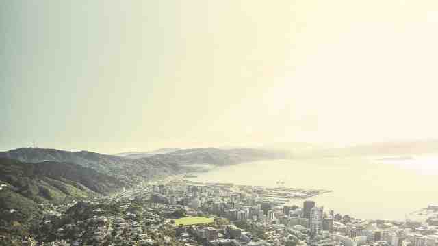 A wide shot of Wellington harbour with Wellington city in the foreground.
