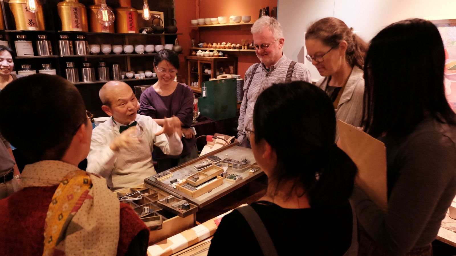 Wai-te-ata team enjoy a typesetting demonstration by Mr. Wu of Letterpress Teahouse