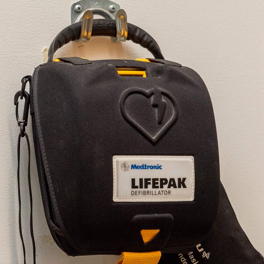 Automatic External Defibrillator or AED mounted on a wall