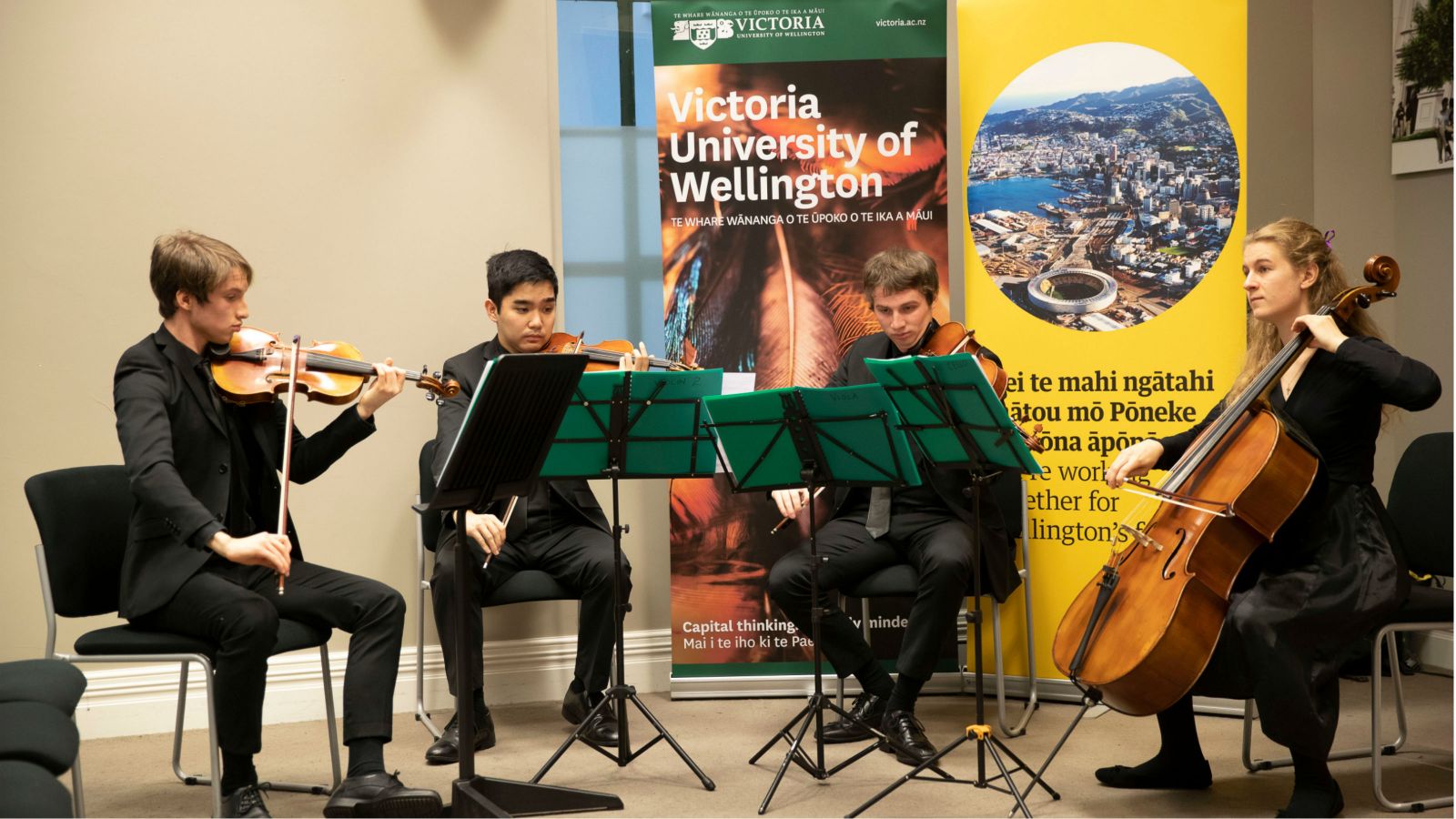 Students from the NZSM play during the signing of the agreement.