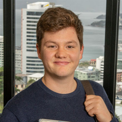 Arts student Jesse Peebles with Wellington in background