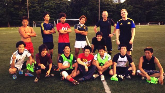 Stuart Benson and his Japanese rugby team.