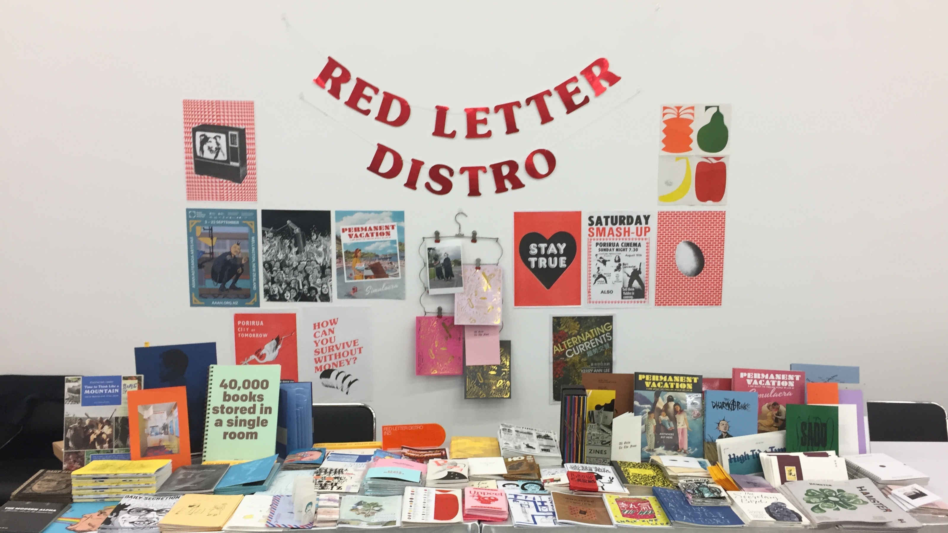 Kerry Ann Lee's table of NZ print matter at BOOKED: Hong Kong Art Book Fair 2020, as RED LETTER DISTRO