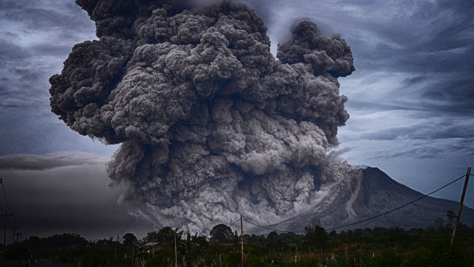 Massive billowing clouds from an eruption of Mt Sinabung, Indonesia. Photo: Yosh Ginsu, Unsplash.