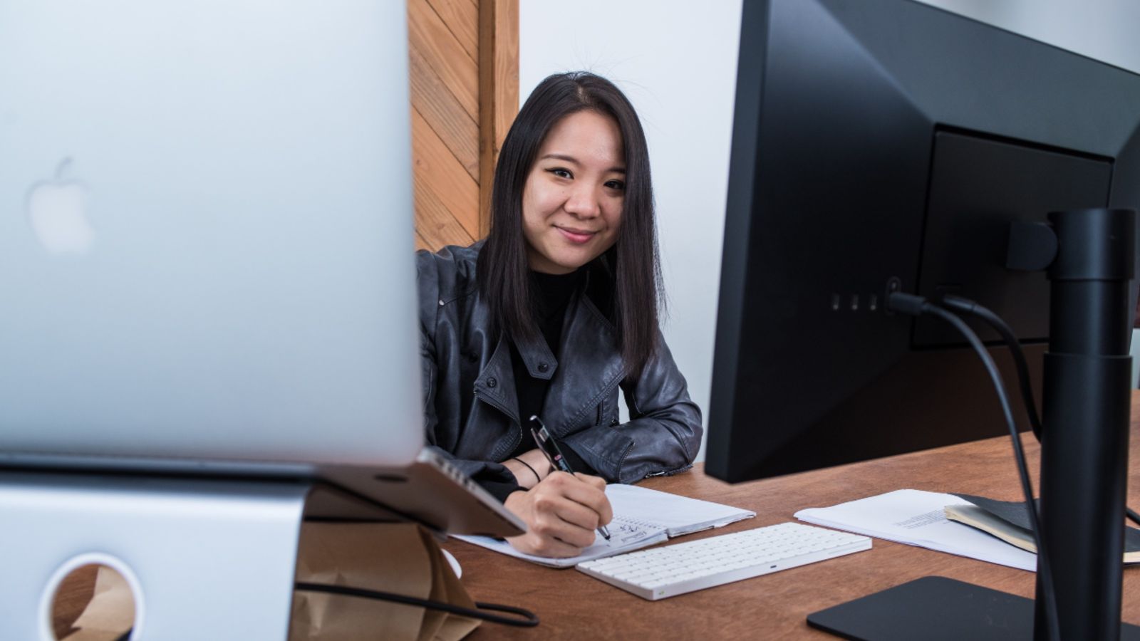 ShuRun Yap at her desk at Cigna