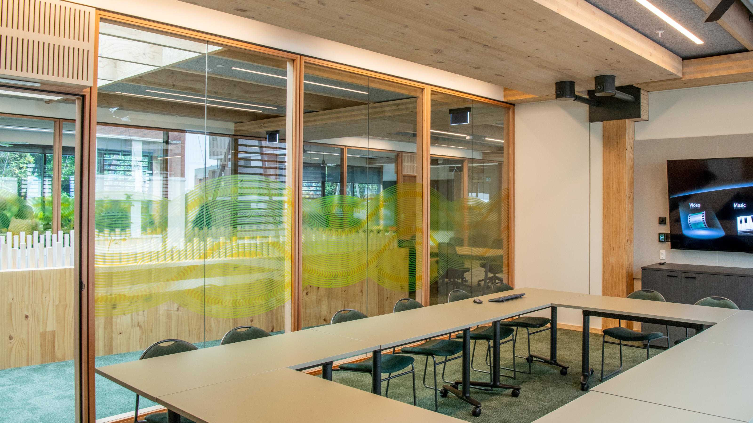 Attractive seminar room with chairs around a central table.