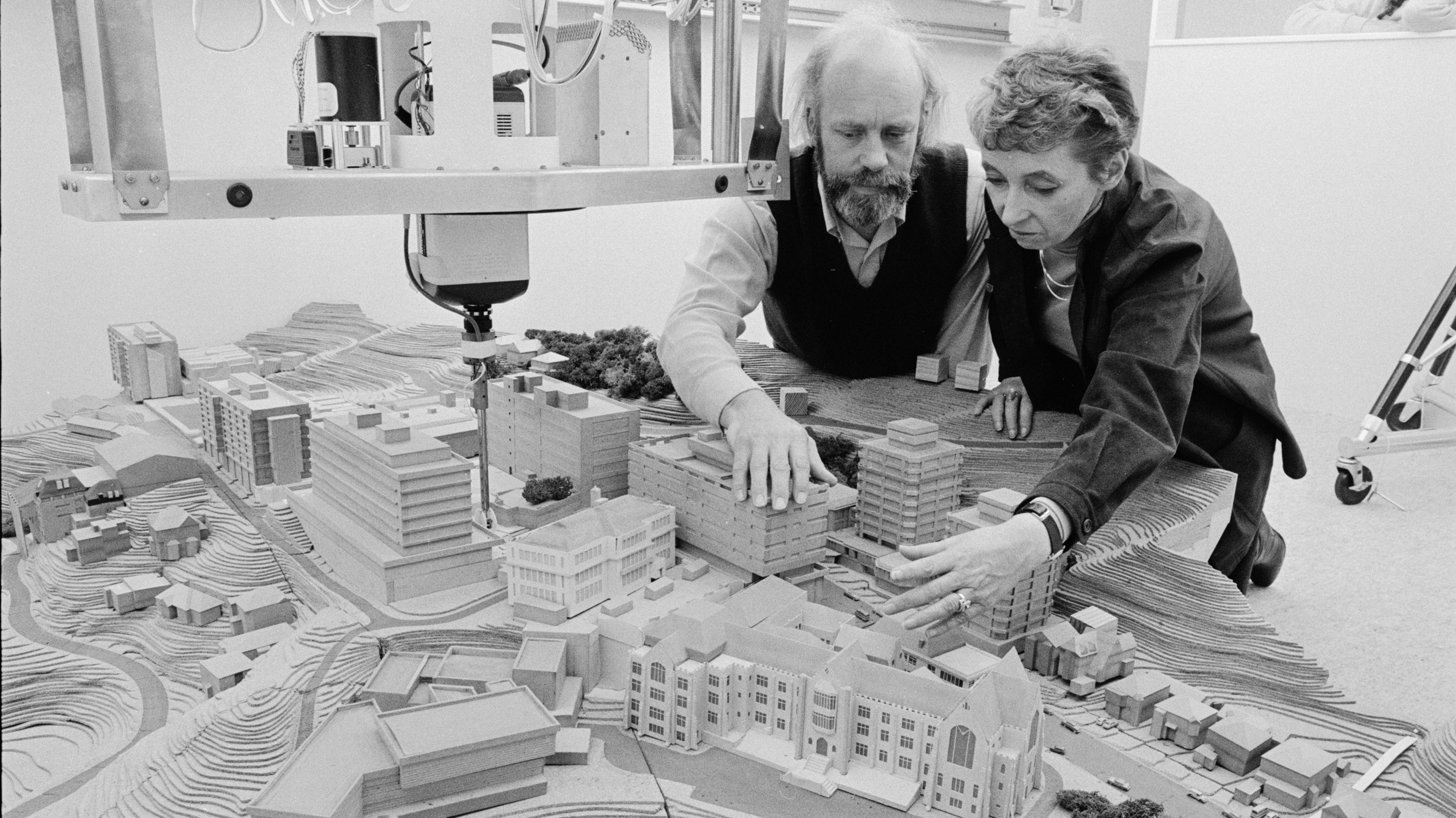 Professor Helen Tippett and David Reed with model of Victoria University campus Dominion Post image courtesy Alexander Turnbull Library, Wellington, New Zealand. Professor Helen Tippett and David Reed stand beside a model of Victoria University of Wellington's Kelburn campus