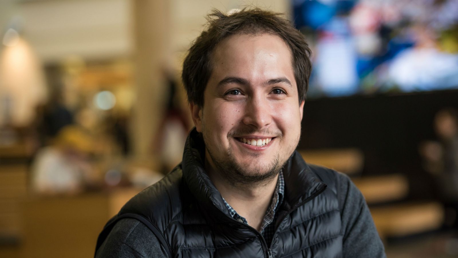 Jesse-Lee Dimech sitting in The Hub on Kelburn campus